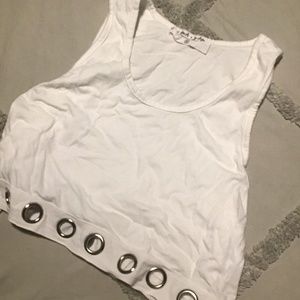 Cropped white tank top with holes at the bottom